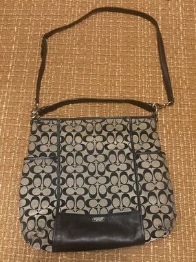 Coach Signature Canvas Shoulder Bag in Black and Tan